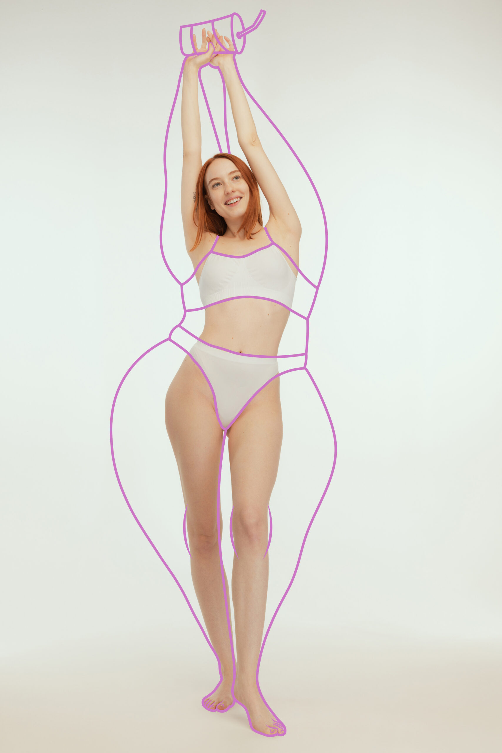 Full-length portrait of slim woman posing in underwear isolated over grey studio background. Lines around body before losing weight.. Concept of healthy eating, dieting, weight, fitness, ad